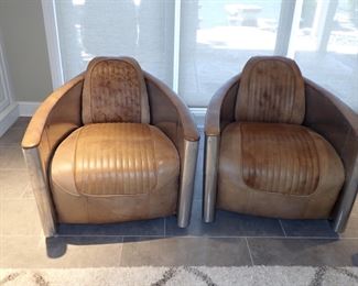  AMAZING CHAIRS     PAIR OF CONTEMPORARY RESTORATION HARDWARE LEATHER AND ALUMINUM CLUB CHAIRS         Berkshire leather and polished aluminum take form to create one of Restoration Hardware’s most iconic chairs. 