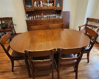 Handmade in the Philippines,  late 1960's. The maker of this table and the next items (China hutch and buffet) was the same man. He was shown a Sears catalog and asked to make them for him.