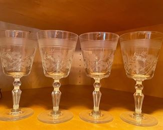 Set of 5 etched wine glasses,  $10