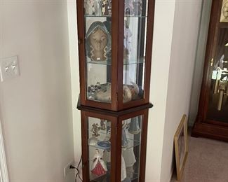 Glass octagon curio cabinet,  $75