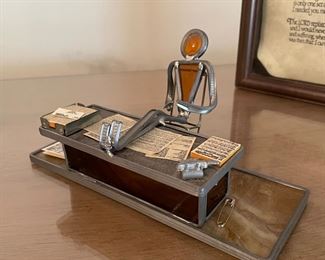 Man at desk with feet up,  $14