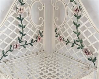 Additional view of detail on top of metal corner shelf unit