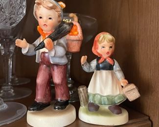 Hummel style boy carrying umbrella with basket of fruit,  $12.  Imarco Hummel-looking Peasant Girl Carrying a Basket ,  $10