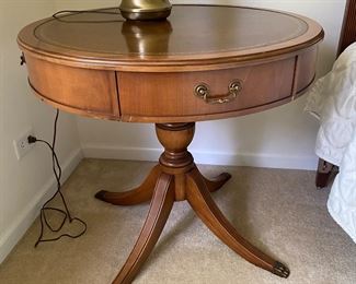 Round leather top end table,  $99