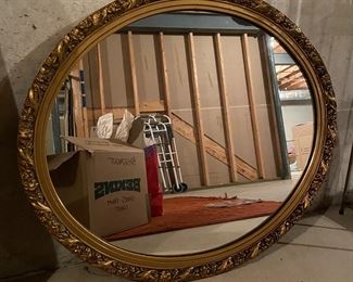Oval gold mirror, $35
