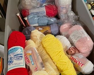 Assortment of yarn and knitting needles, $2-$4 per skeen