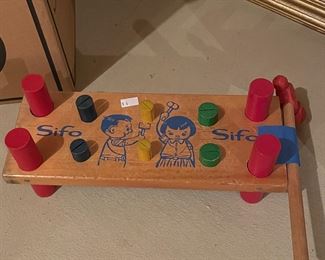 Sifo hammer and wooden pegs,  $4