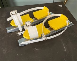 Vintage yellow metal ice skates,  $4