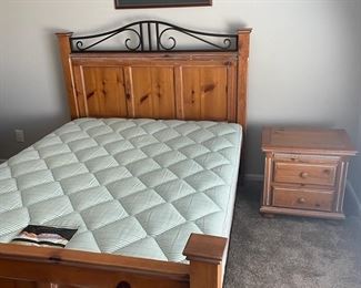 Beautiful Queen Bed With Matching Nightstand And Piece Of Art