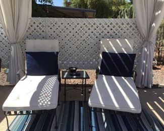 Chic Wrought Iron Lounge Chairs with Cushions, Table, and Backyard Dcor