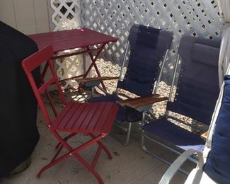 Three Chairs A Table For Around The Pool