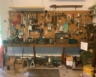 Tools and lots of screws and nails still in bags. Large box of deck nails