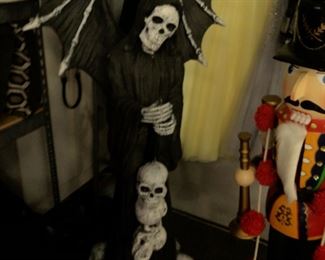 5 foot Halloween decoration and at least 4 foot nutcracker