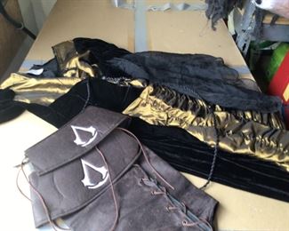 Women’s purses and lots of women’s clothes and dresses