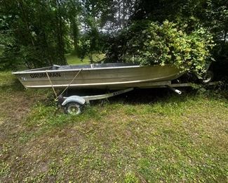 Grumman Bass fishing boat with trailer