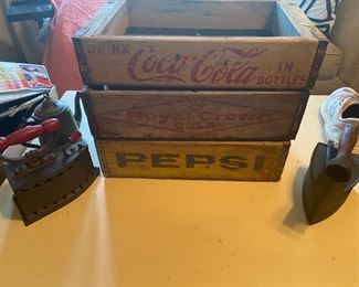 Vintage Wooden soda, crates, and antique coal irons