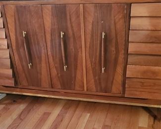 This is a beautiful Merton Gershun for American of Martinsville - Mid Century -Walnut and Brass