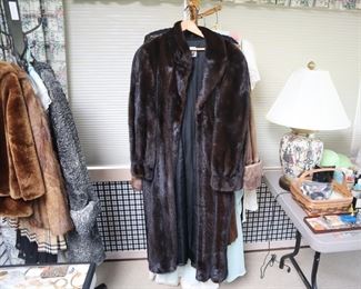 Mink coat ($450), Persian lamb coat ($100),  Burberry skirt, vintage dresses ($10-25 each)