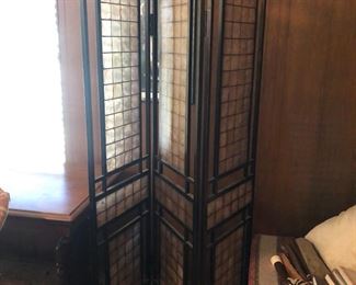Folding room divider with interesting pane details