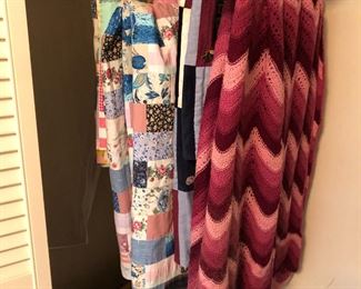 Quilts and colorful knitted throw