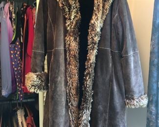 Leather coat with faux fur trim
