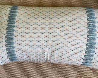 Lumbar Pillow. Measures 24" x 12."