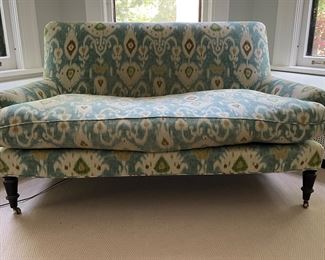 Aqua Ikat Upholstered Down-Filled Seat Settee. Measures 64” W x 32” D. Photo 1 of 2.