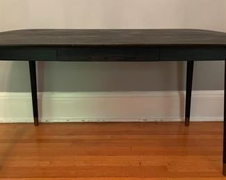 Crate & Barrel Kidney Shape Ebonized Wood Desk. Measures 56" W x 28" D. Photo 1 of 2.