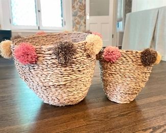 Natural Fiber Baskets Adorned with Pom Pots.