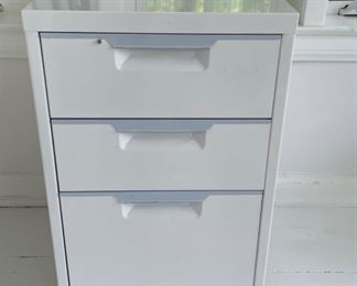 White Metal Three Drawer File Cabinet on Casters.