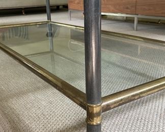 Mastercraft- Style Brass & Glass Cocktail Table on Casters. Measures 58" W x 24" D x 16" H. Photo 2 of 3.
