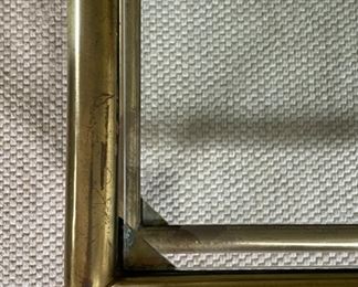 Mastercraft- Style Brass & Glass Cocktail Table on Casters. Measures 58" W x 24" D x 16" H. Photo 3 of 3.