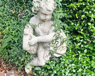 The estate features a variety of vintage cement garden/yard cement statues