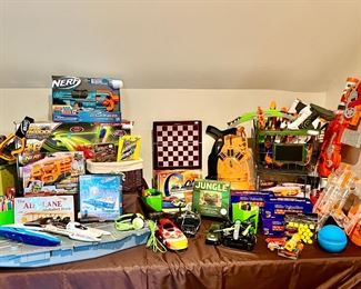 A BOY'S DREAM!  LOTS OF NERF GUNS AND BULLETS.  NERF WAR!  I'VE GOT A TEEN THAT LOVED NERF GROWING UP!