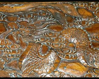 Showing Close Up of the Dragon on the Carved Trunk 