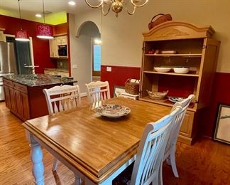 Ashley Furniture Oak Dining table 
Farm Style table 
Solid Oak dining table with leaf 
4 side chairs 