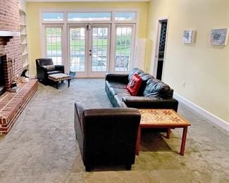 Black Leather sofa and 2 chairs
2 mid century teak tables with tile inserts 