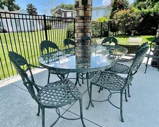 SOLD Art Nouveau Ginko leaf motif
Vintage Leaders Dining 
Forged Aluminum 
Oval Glass top table + 8 Arm Chairs 
Finish: Aged Verdigris 