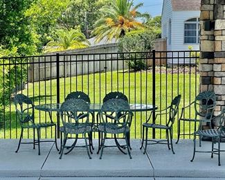 SOLD Art Nouveau Ginko leaf motif
Vintage Leaders Dining 
Forged Aluminum 
Oval Glass top table + 8 Arm Chairs 
Finish: Aged Verdigris 