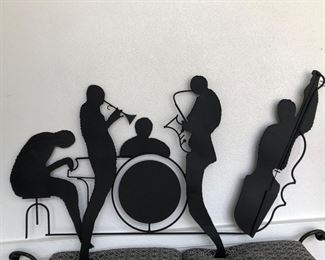 Curtis Jere 
Torched metal wall art of a jazz quartet