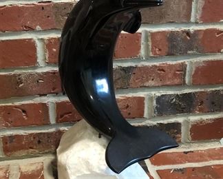 15 1/2” hand carved marble dolphin on a quartz base