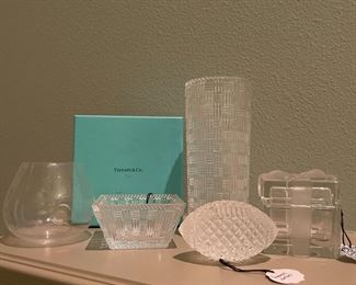 Tiffany & Co. basketweave cylinder vase, square nut dish and Crystal Bow box. All have their Tiffany tags. 
Elsa Pereti Cognac glass, signed 
Swarovski Football
