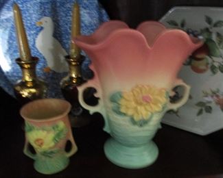 Just a sample of pottery offered in this sale.  Hull vase and small Roseville.