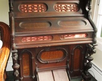 Organ in very ornate Victorian cabinet