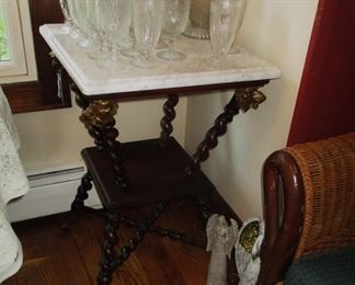 Great Victorian side table with turned legs and marble top.  