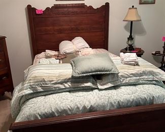 Antique oak bed and linens