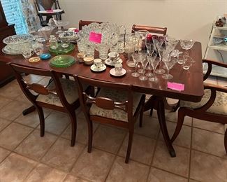 Antique Duncan Phyfe dining table and matching china cabinet