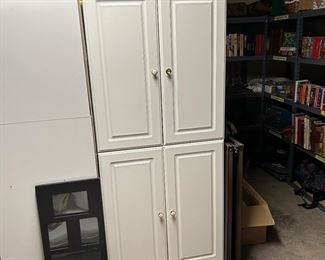 3 white cabinets 