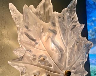 From the sconce to the monumental chandelier, Lalique was inspired by the Champs-Élysées bowl designed in 1951 by Marc Lalique to create this lighting collection. 