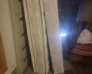 Queen mattress clean. No rips.